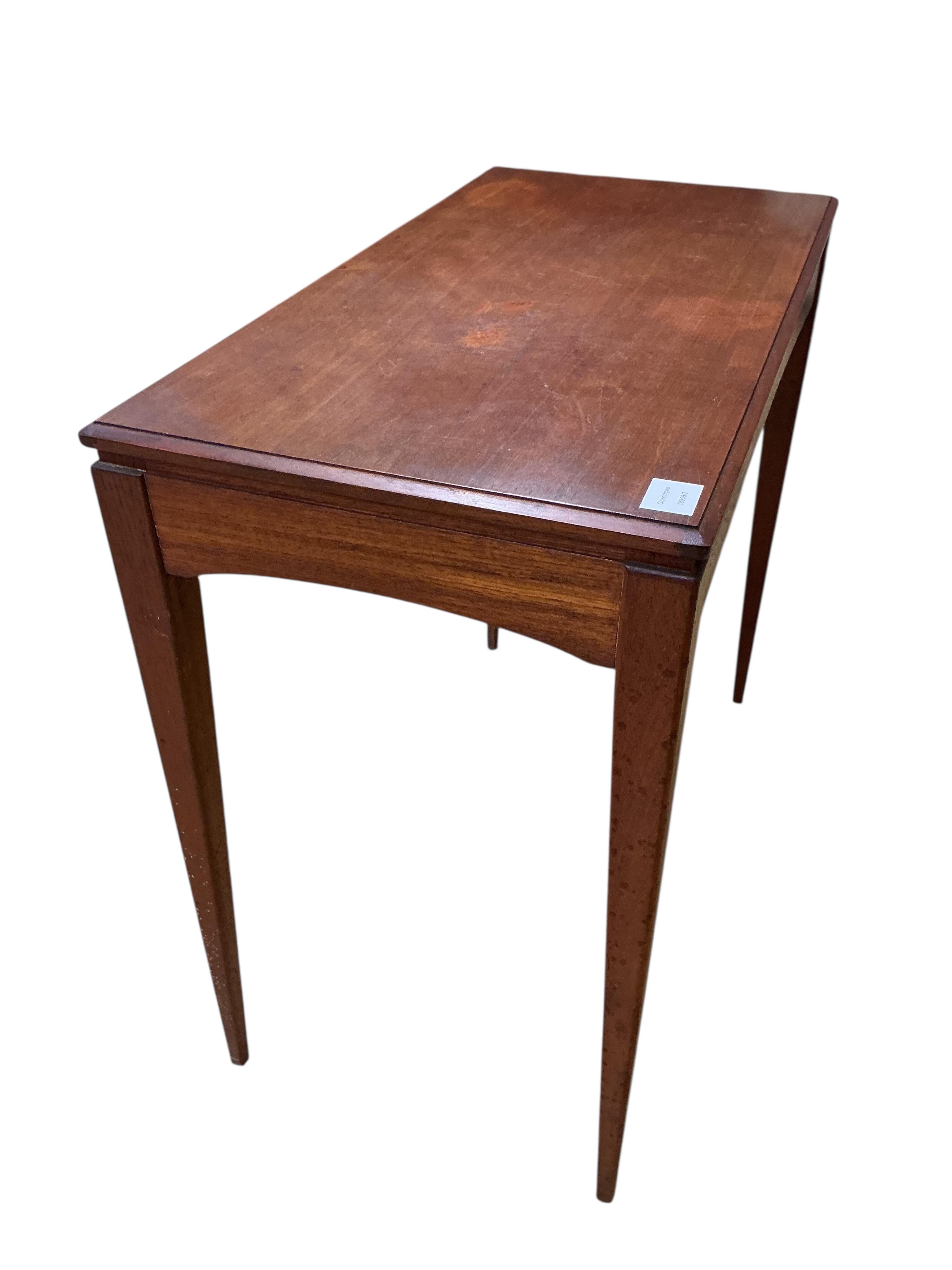 In the manner of Gordon Russell, a mid century rectangular teak side table, width 85cm, depth 44cm, height 76cm